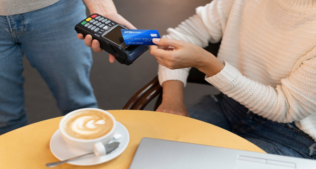 person-paying-with-its-credit-card